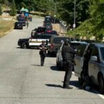 Le forze dell'ordine intervenute nell'Idaho dove un cecchino ha teso un'imboscata ad una squadra di vigili del fuoco