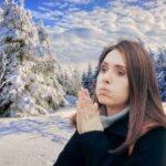 sfondo paesaggio invernale e donna infreddolita